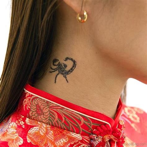 scorpion neck tattoo.